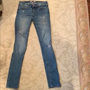 Hollister medium wash lightly ripped skinny jeans